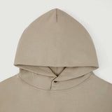 Top-half close-up of the cream Soul Supremacy Snap Button Collar Hoodie Encoded Motifs showing the hood and snap button collar detail